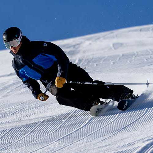 Jans Expert carving on a freshly groomed ski run at Deer Valley Resort, Park City, Utah.