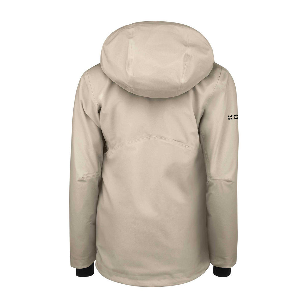 Women’s Head Kore Nordic Jacket in a cream color, shown with a longer cut and technical design features for cold-weather freeride skiing.