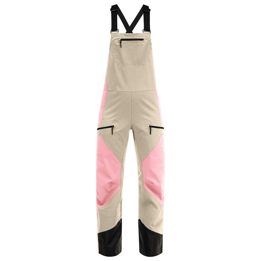 Women’s Head Kore Bib Pant in cream rose, featuring a technical design for cold-weather freeride skiing with full coverage and adjustable fit.