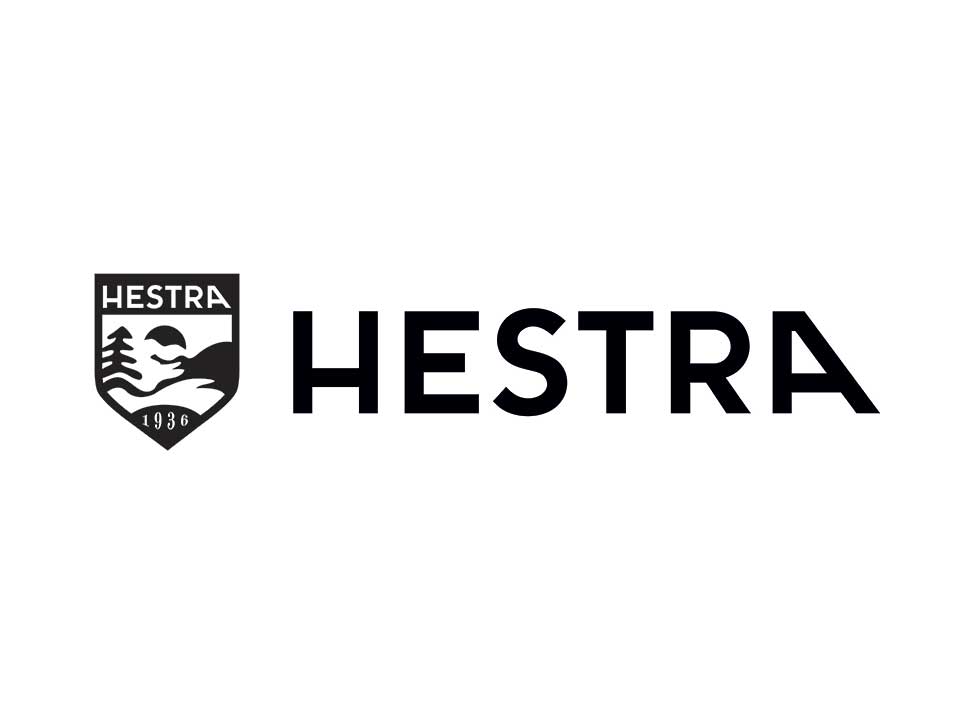 HESTRA logo with brand name and emblem on a white background