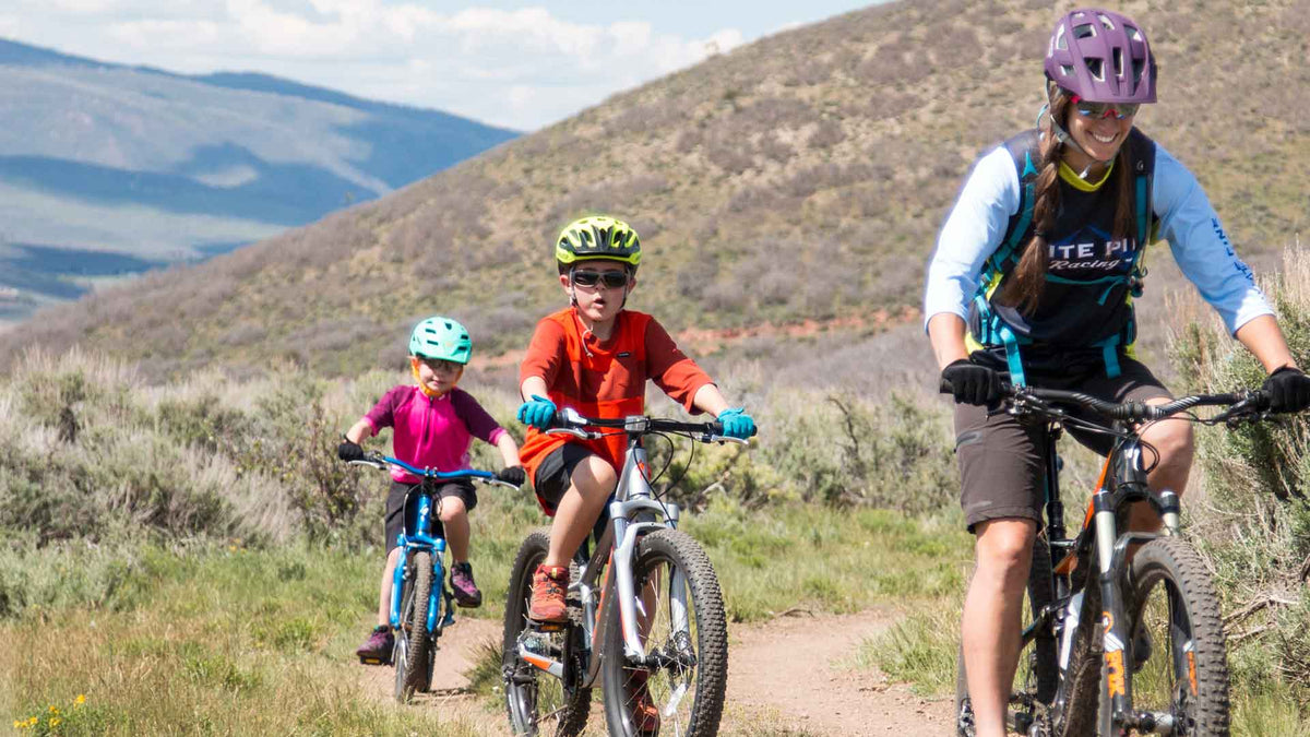 Jans expert leading a guided mountain bike tour in Park City, Utah.