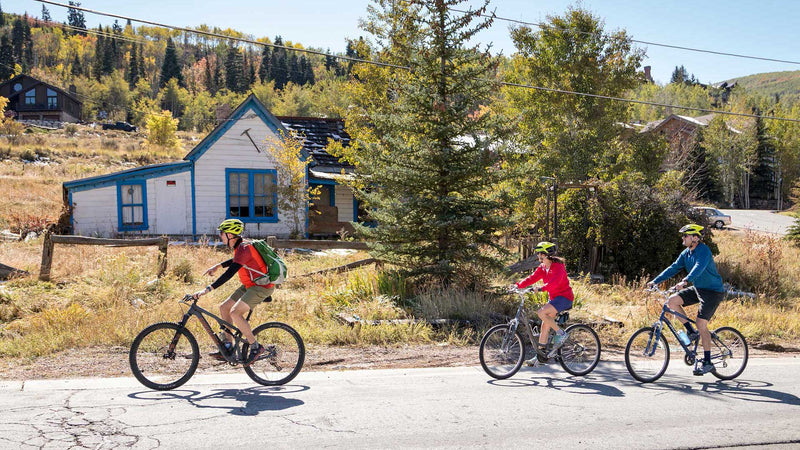 Jans Expert leading a historic biking tour through Park City, Utah.