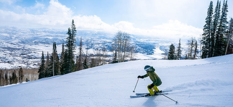 Jans Expert skiing down a groomed run at Deer Valley Resort, Park City, Utah.