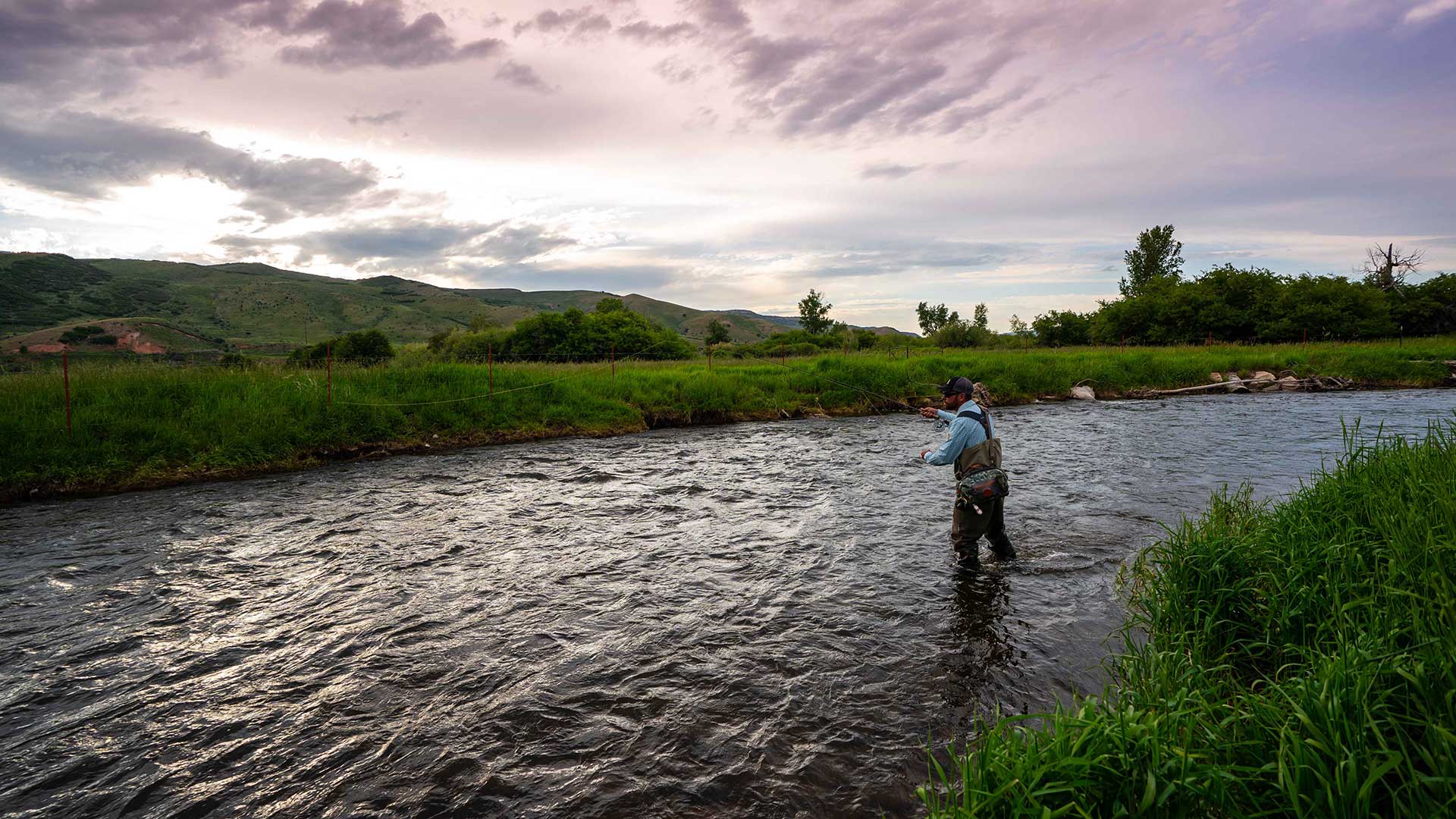 Jans fly fishing guide fishing on a river near Park City, Utah.