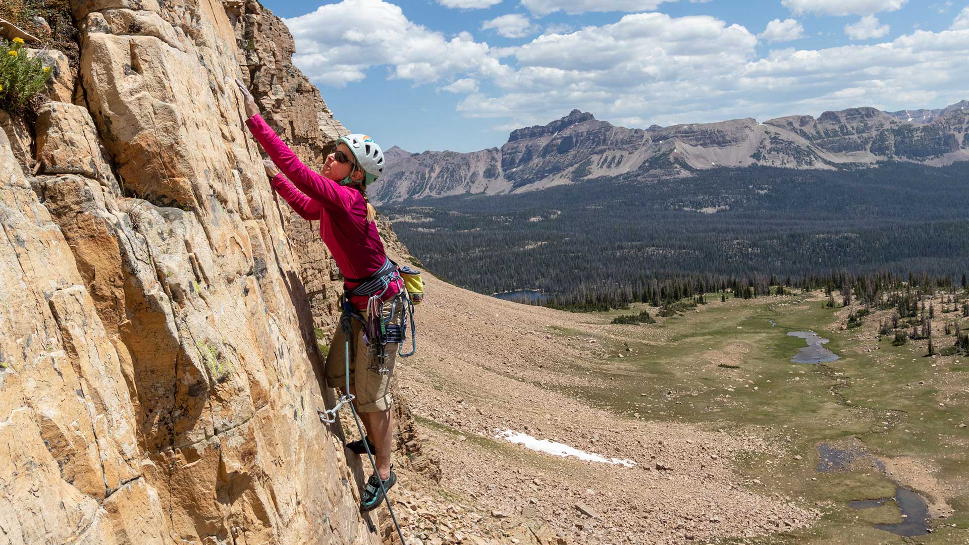 White Pine Touring climbing guide leading a sport climb in the Uinta Mountains near Park City, Utah.